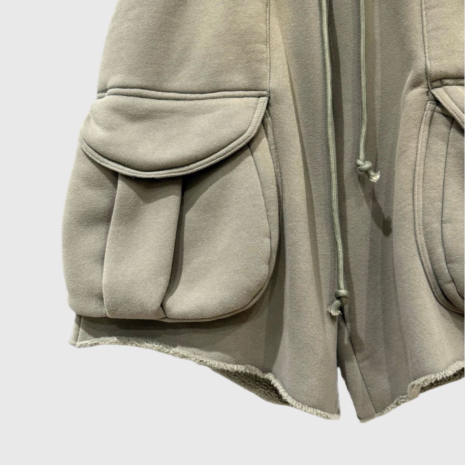 Green multi pocket shorts
