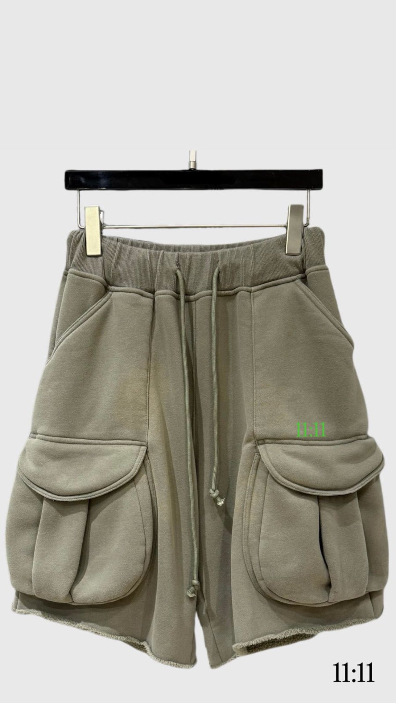 Green multi pocket shorts