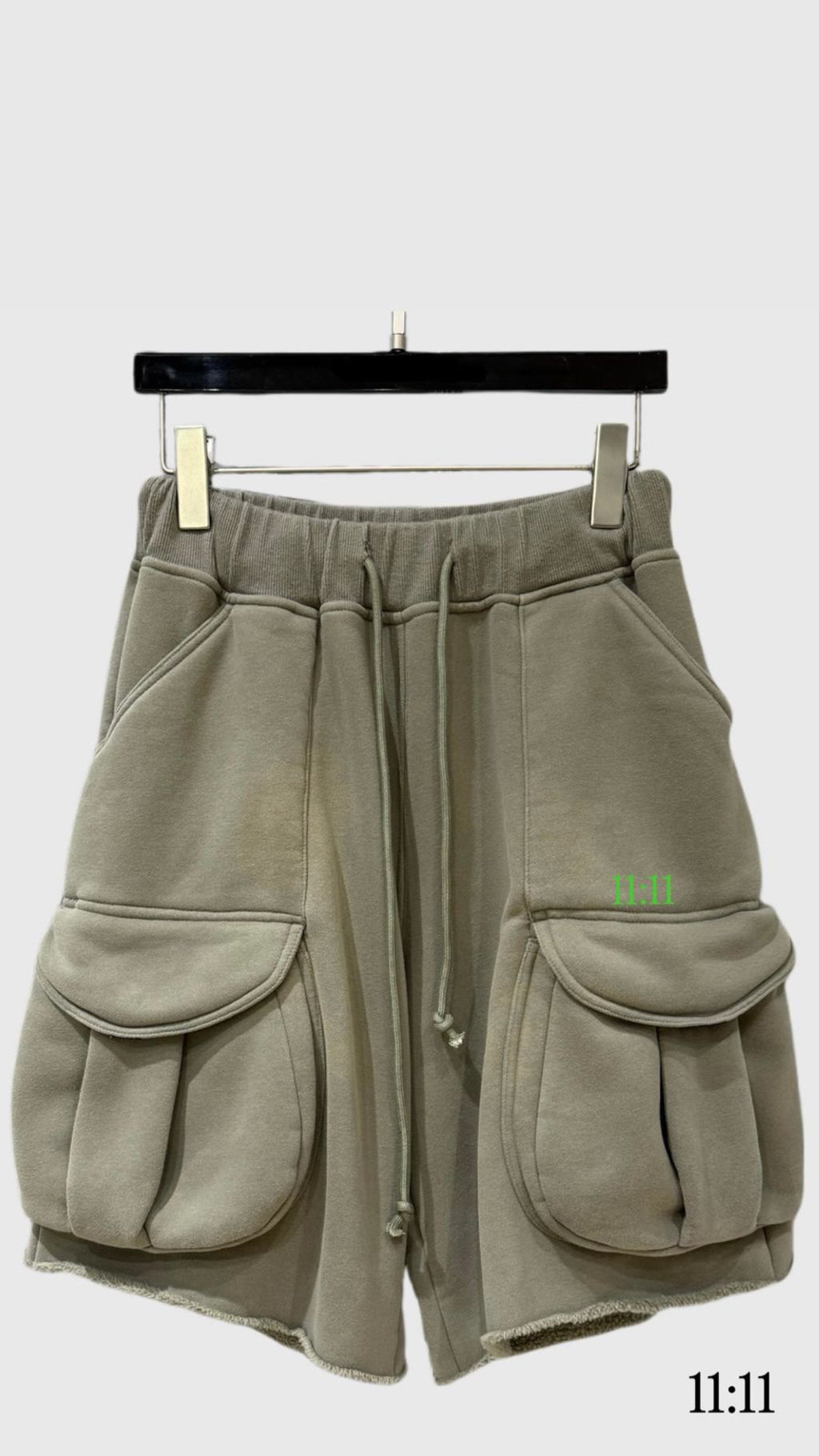 Green multi pocket shorts